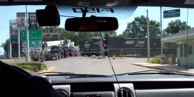Amateur Footage Shows Train Crashing Into 18-Wheeler Stuck on Tracks
