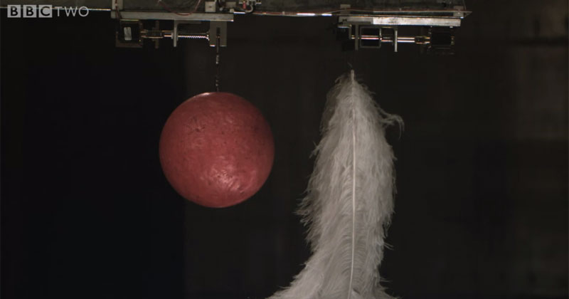 bowling ball and feather experiment in a vacuum