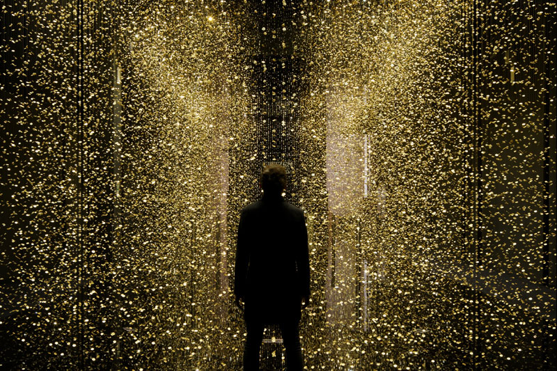 Art Installation Suspends 80,000 Shimmering Watch Plates for People to Walk Through