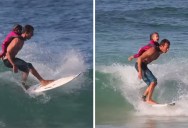 Father and Daughter Go for Cutest Surf Ride Ever