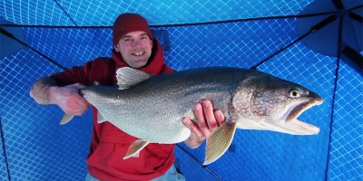 Guy Catches Monster Lake Trout Ice Fishing 32 km Out on Lake Superior