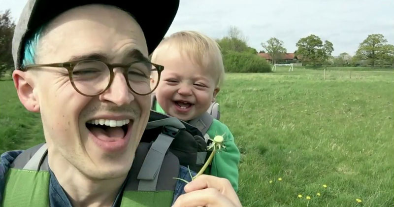 Baby Can't Stop Laughing at his Dad Blowing on Dandelions