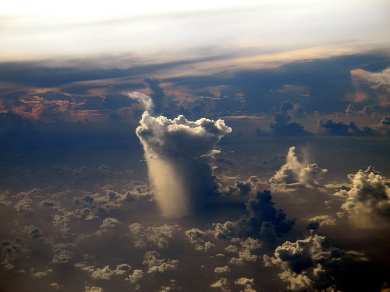 lonely rain cloud from above aerial pacific ocean Picture of the Day: A Lonely Rain Cloud Somewhere in the Pacific