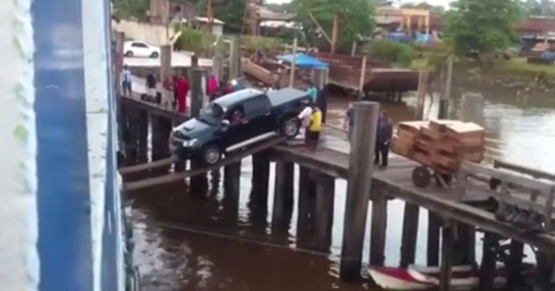 Truck Attempts to Board a Ship Over Planks