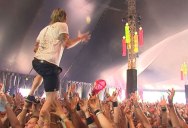 Crowd Surfing Singer Catches Long Distance Beer, Chugs It Like a Rockstar