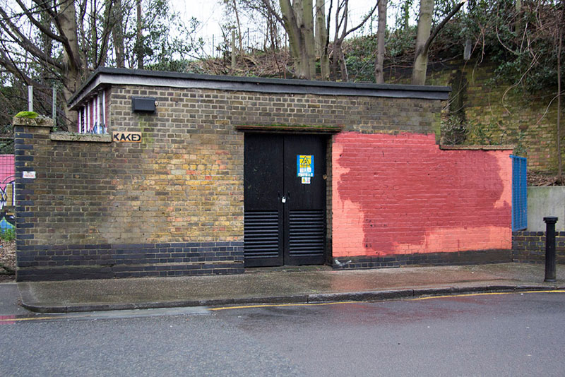 Street Artist mobstr and City Worker Have Year Long Exchange on Red Wall in London (25)