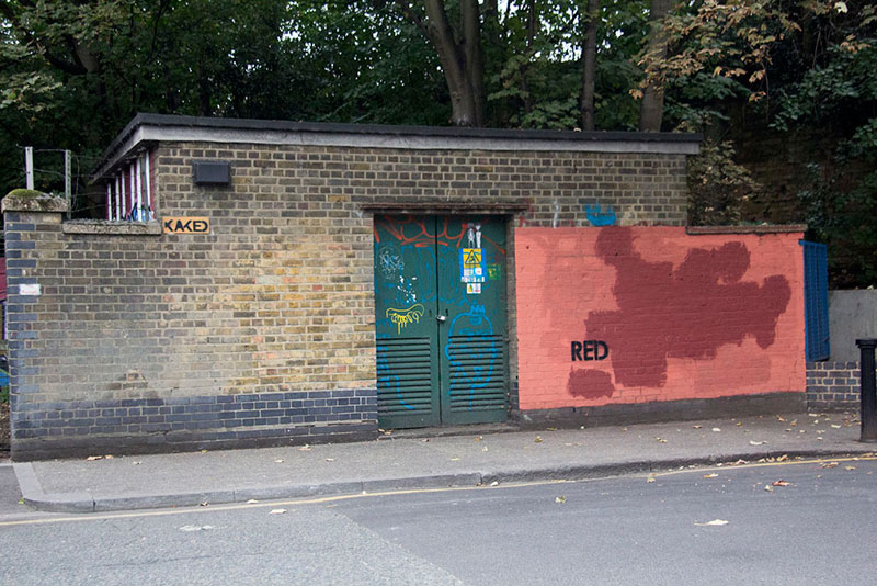 Street Artist mobstr and City Worker Have Year Long Exchange on Red Wall in London (5)