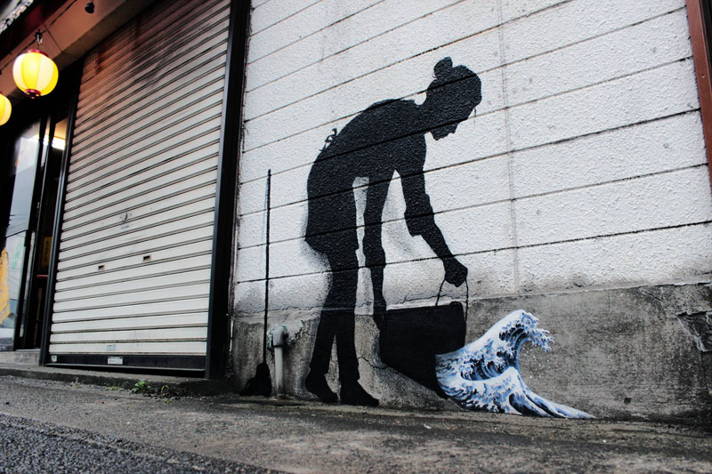 pejac street art the great wave Picture of the Day: The Great Bucket Wave