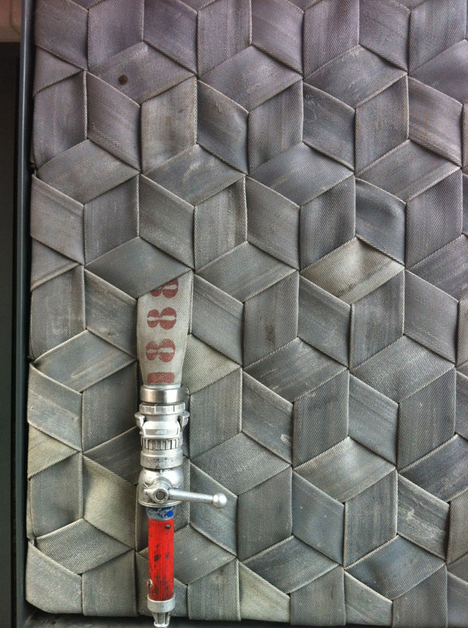 door made from fire hose pin pon restaurant brussels belgium (1)