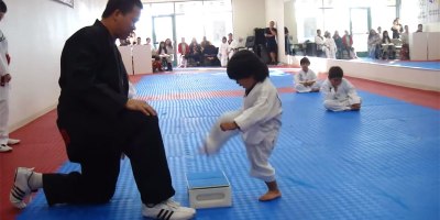 Little Kid (Eventually) Breaks Board to Earn White Belt