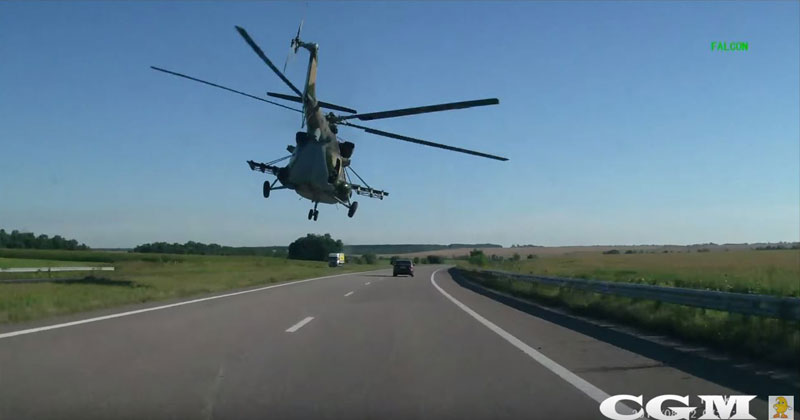 Riding With a Helicopter Down a Highway in Ukraine