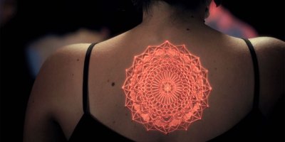 Artists Bring Tattoos to Life with Live Projection Mapping