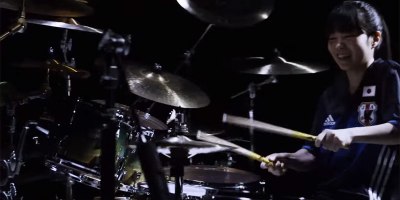 Let This Drumming Prodigy Melt Your Face While Smiling