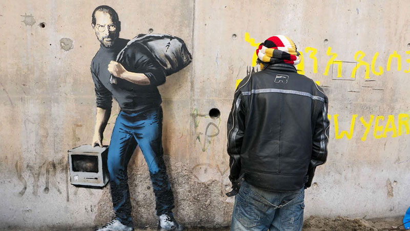 New Banksy Mural of Steve Jobs Highlights Refugee Crisis