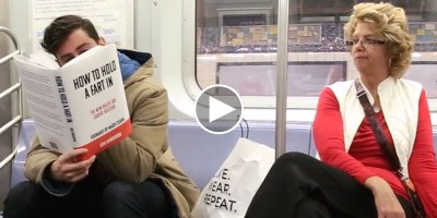 Guy Goes on Subway With Ridiculous Fake Book Covers and Records People's Reactions