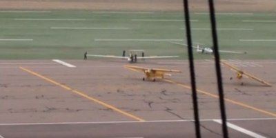 Sudden Microburst Wind Storm Causes Grounded Planes to Inadvertently Take Off