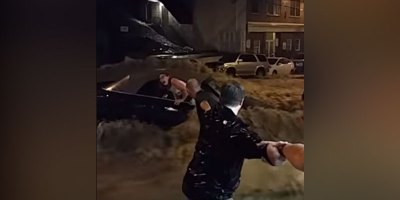 Heroic Citizens Form Human Chain to Save Woman from Flash Flood