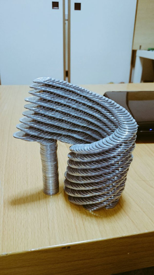amazing coin stacking by thumb tani on twitter 25 Next Level Coin Stacking by @Thumb Tani