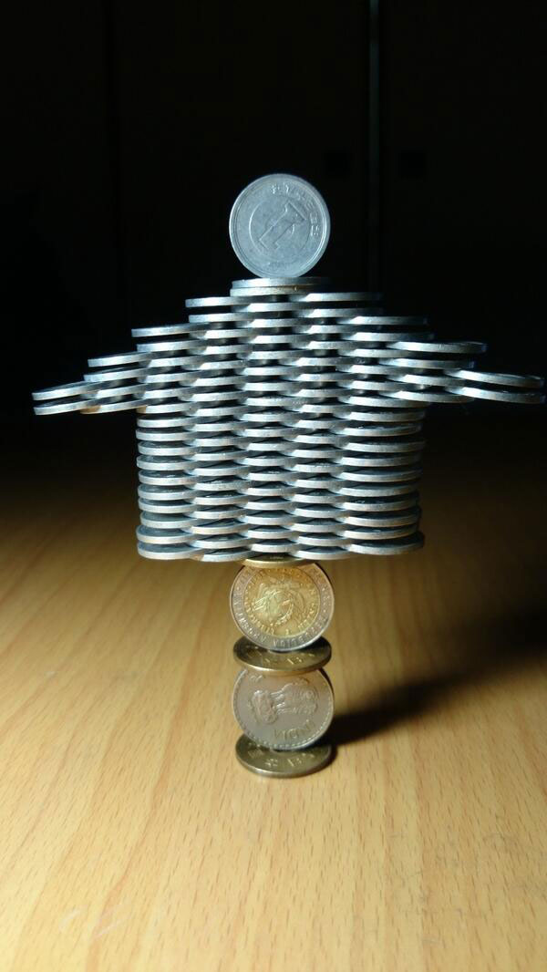 amazing coin stacking by thumb tani on twitter 3 Next Level Coin Stacking by @Thumb Tani