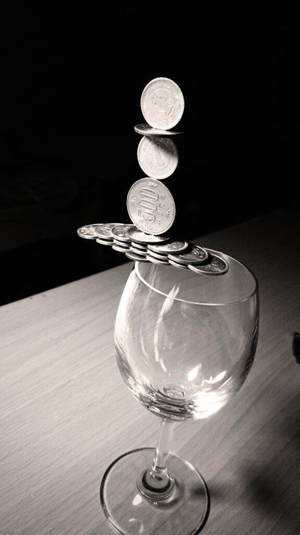 amazing coin stacking by thumb tani on twitter 7 Next Level Coin Stacking by @Thumb Tani