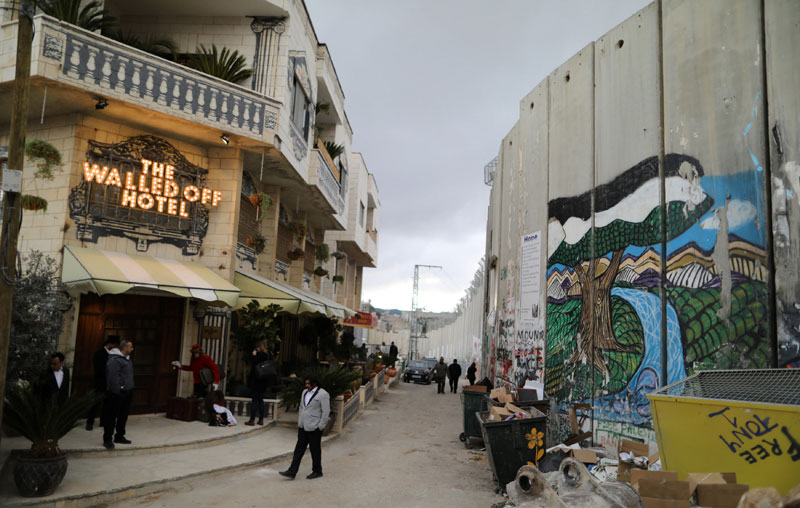 banksy hotel west bank palestine Banksy Opens Art Hotel with Worlds Worst View