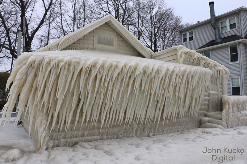 house incased in ice by john kucko digital 2 Crashing Waves, Strong Winds and Freezing Temps Encase Home in Ice