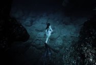 This Steadicam Shot of a Free Diver Going Through an Underwater Cave is Awesome