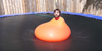 Submerged Inside a 6ft Water Balloon Until It Pops in Super Slow Motion