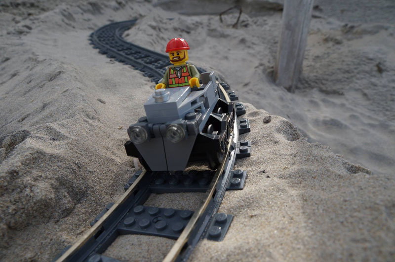 lego sand roller coaster by 5 mad movie makers 2 This Lego Sand Roller Coaster on the Beach is Awesome