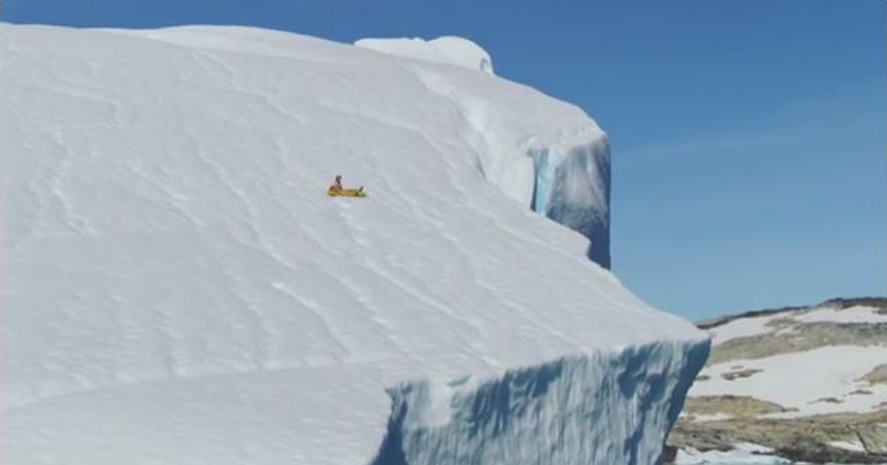 Lunatic Rides Inflatable Pizza Slice Off 300 ft Iceberg in Greenland