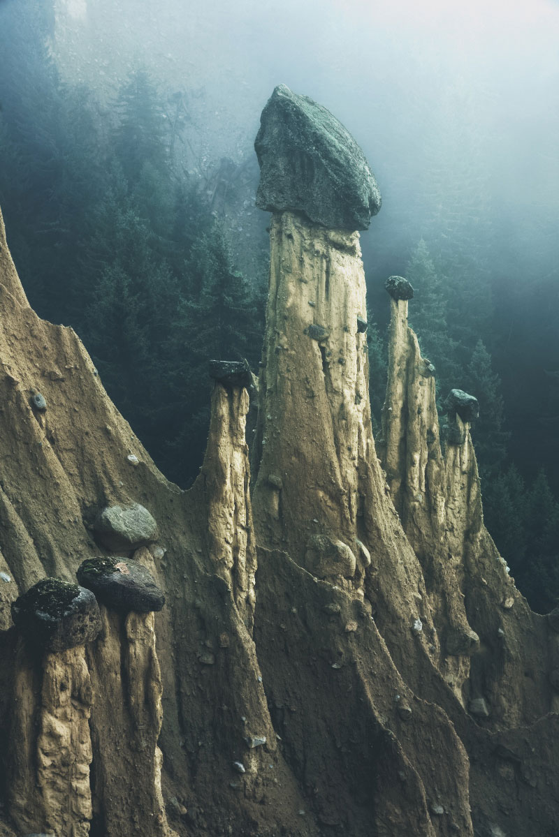 earth pyramids of south tyrol kilian schonberger otherworld 8 The Earth Pyramids of Italy: Where Boulders Perch Atop Pillars of Clay