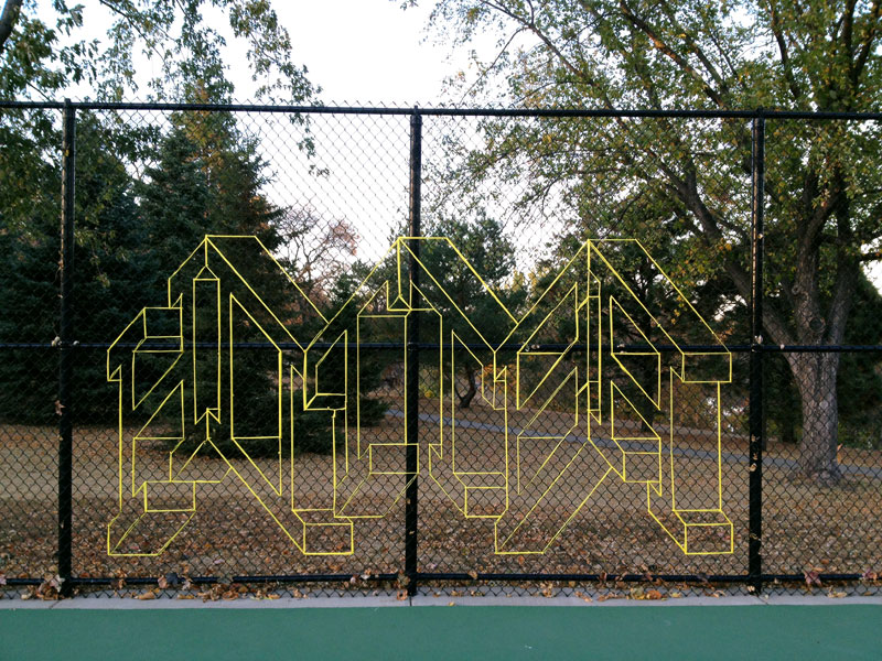 street artist hot tea yarn fence 3d letters 6 This Artist Uses Yarn to Create Amazing 3D Letters on Chain Link Fences