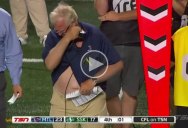 This Coach Trying to Take Off His Headset is What You Need Right Now