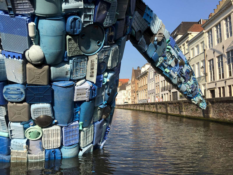 giant whale made from 10000 pounds of plastic ocean waste by studiokca bruges triennial 3 A 38 ft Tall Breaching Whale Made From 10,000 Pounds of Plastic Ocean Waste