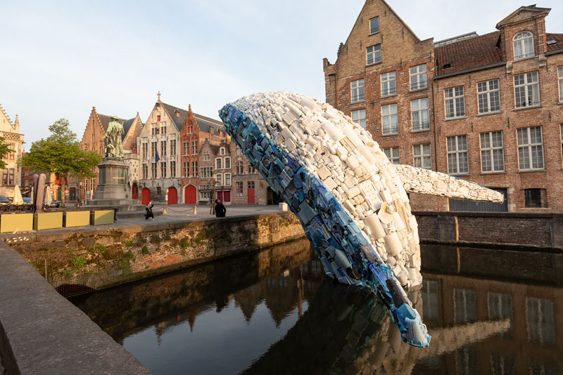 giant whale made from 10000 pounds of plastic ocean waste by studiokca bruges triennial 6 A 38 ft Tall Breaching Whale Made From 10,000 Pounds of Plastic Ocean Waste