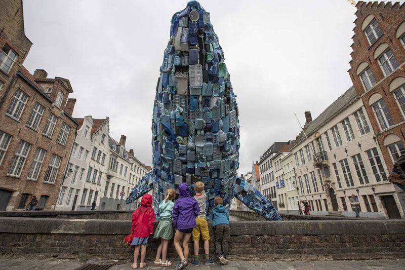 giant whale made from 10000 pounds of plastic ocean waste by studiokca bruges triennial 9 A 38 ft Tall Breaching Whale Made From 10,000 Pounds of Plastic Ocean Waste
