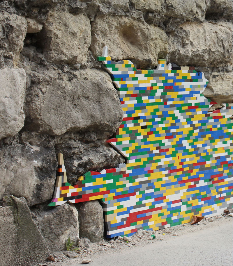 filling holes and cracks in walls with lego jan vormann 7 People Around the Globe Are Filling Cracks With LEGO (10 Photos)