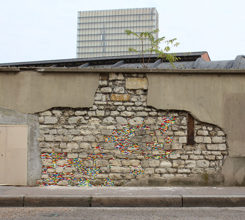 filling holes and cracks in walls with lego jan vormann 8 People Around the Globe Are Filling Cracks With LEGO (10 Photos)
