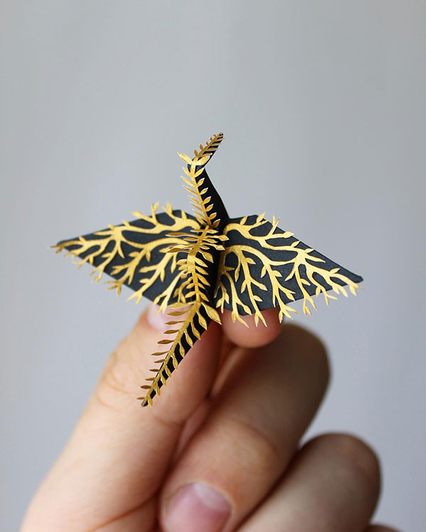 paper crane decorations by cristian marianciuc 12 Paper Artist Folds Cranes and Then Gives Them Intricate Decorations