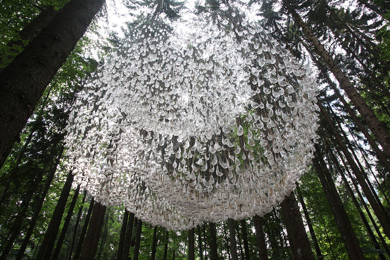 a giant chandelier in the forest made from tiny rainwater catchers 10 A Giant Chandelier in the Forest Made From Tiny Rainwater Catchers