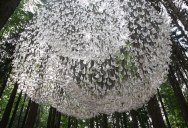 A Giant Chandelier in the Forest Made From Tiny Rainwater Catchers