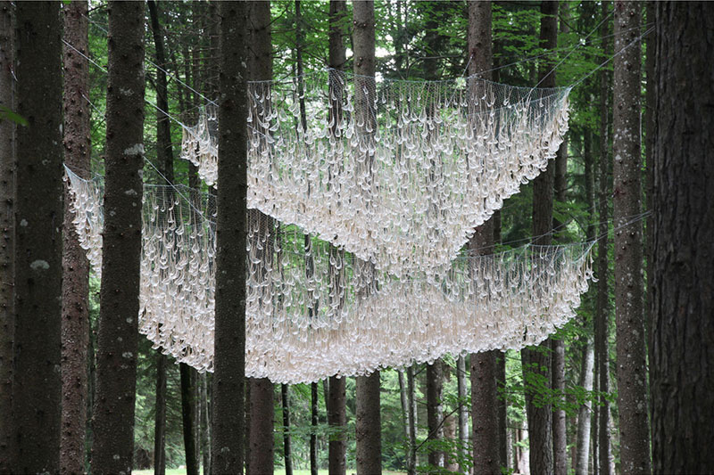 a giant chandelier in the forest made from tiny rainwater catchers 2 A Giant Chandelier in the Forest Made From Tiny Rainwater Catchers