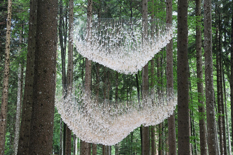 a giant chandelier in the forest made from tiny rainwater catchers 3 A Giant Chandelier in the Forest Made From Tiny Rainwater Catchers