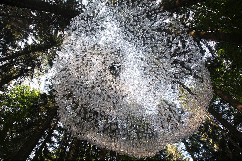 a giant chandelier in the forest made from tiny rainwater catchers 6 A Giant Chandelier in the Forest Made From Tiny Rainwater Catchers