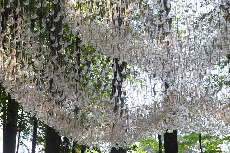 a giant chandelier in the forest made from tiny rainwater catchers 8 A Giant Chandelier in the Forest Made From Tiny Rainwater Catchers