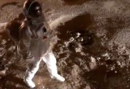 Guy Fakes Walking on the Moon in Protest of Giant Potholes on the Road