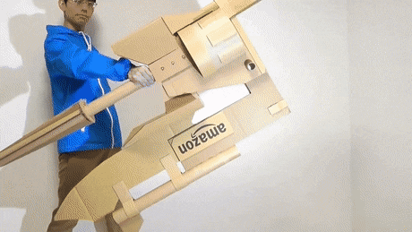 guy makes toy weapons from old amazon boxes 11 Guy Makes Oversized Novelty Weapons from Old Amazon Boxes