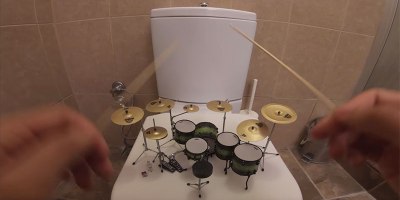 Slaying System of a Down's 'Toxicity' on a Miniature Drum Kit
