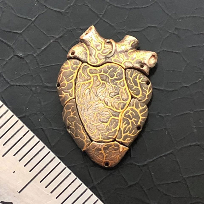 beating heart coin by roman booteen 1 This Beating Heart Coin Carved by Roman Booteen is Absolutely Wild