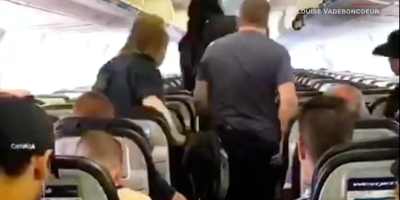 Rare Footage of People Getting Off a Plane in a Calm and Orderly Fashion